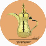 gold coffee pot with hammer dots
